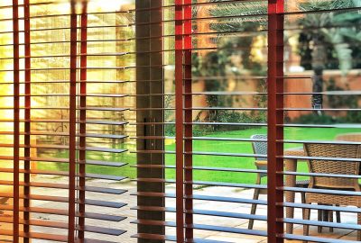 morning-sunlight-through-back-porch-venetian-blind-2022-11-08-08-50-10-utc